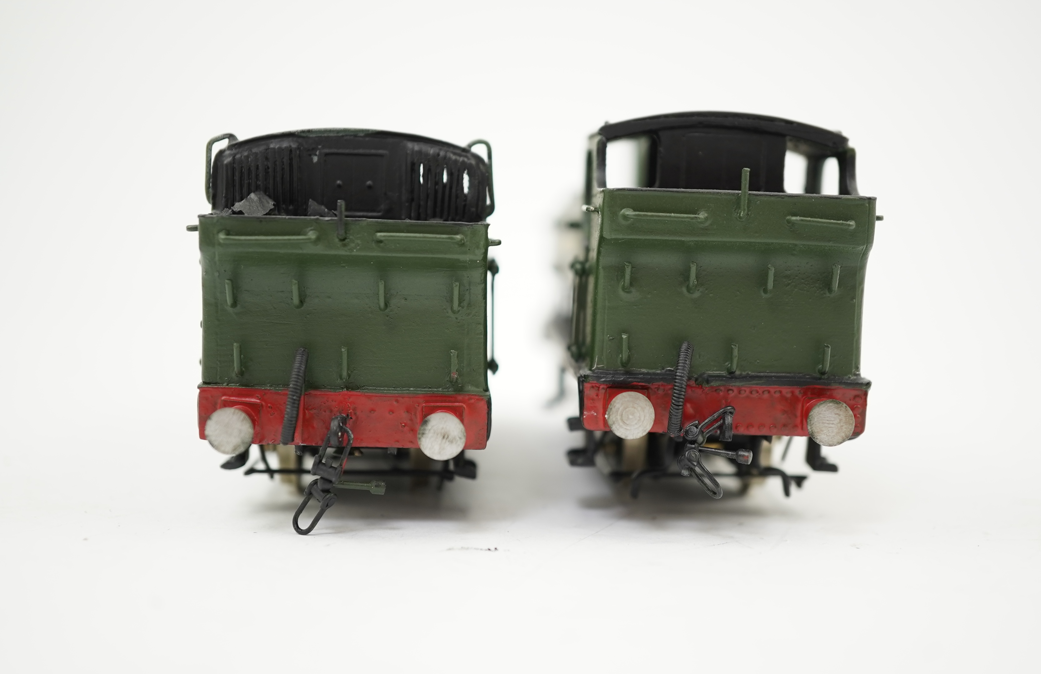 Two 00 gauge brass and white metal kit built GWR Pannier Tank locomotives; a 1600 class 0-6-0PT, 1600, together with an 7400 class 0-6-0PT, 7404, constructed, painted and lined to a high standard, both motored for two ra